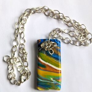 Handcrafted pendant, wire wrapped. Original On a 20" silver chain.  Boxed